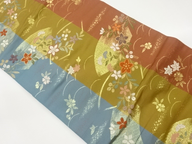 地紙に草花・芝模様織出し名古屋帯